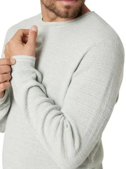 Pull en coton tilleul uni pourvu d'une coupe droite et d'un col rond