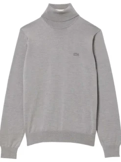 Pull en laine gris chiné avec une coupe droite et un col roulé