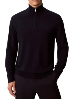 Pull en laine marine uni coupe ajustée avec un col camionneur