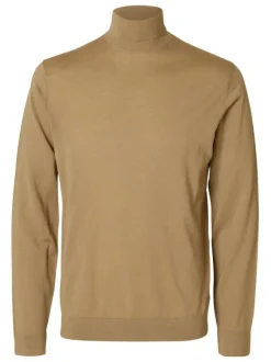 Pull en laine merinos beige uni avec une coupe droite et un col roulé