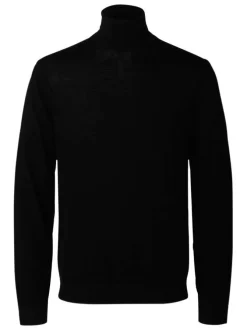 Pull en laine merinos noir uni avec une coupe droite et un col roulé