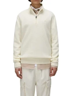 Pull en laine mélangée beige uni avec une coupe droite et un col camionneur