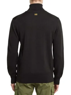 Pull en laine noir uni avec une coupe droite et logo iconique