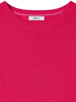 Pull fuchsia uni pourvu d'une coupe droite et de manches courtes