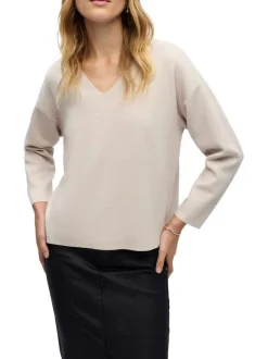 Pull gris uni coupe ample pourvu d'un col v et de manches longues