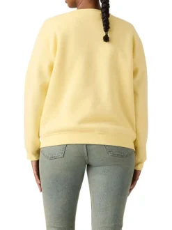 Pull jaune à coupe droite pourvu d'un col rond et de manches longues