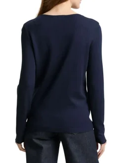 Pull marine uni avec une coupe ajustée et des manches longues