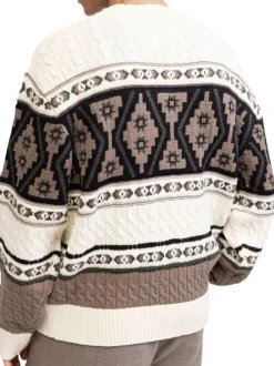 Pull multicolore en maille torsadée avec une coupe ample et un col rond