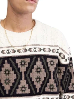 Pull multicolore en maille torsadée avec une coupe ample et un col rond