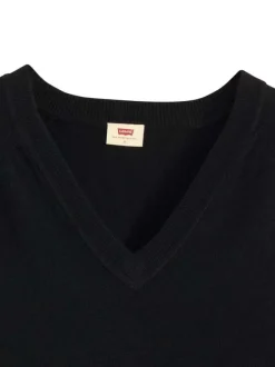 Pull noir avec un col v côtelé et des manches longues