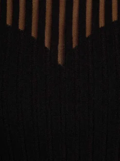 Pull noir côtelé à coupe près du corps et à buste transparent en forme de coeur