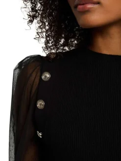 Pull noir uni à col rond pourvu de manches en tulle plumetis