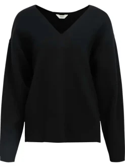 Pull noir uni coupe ample pourvu d'un col v et de manches longues