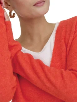 Pull orange uni avec une coupe droite et des manches longues