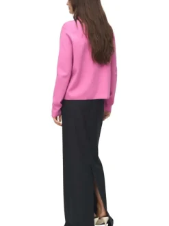 Pull rose basic uni fin avec un col montant et une coupe droite