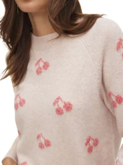 Pull rose coupe ajustée pourvu d'un col ras de cou et de manches longues