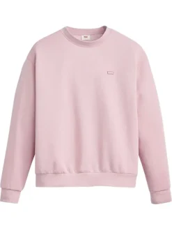 Pull rose à coupe droite pourvu d'un col rond et de manches longues