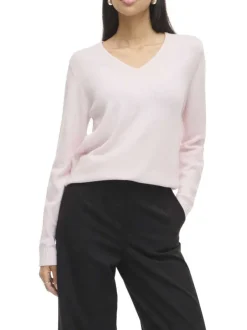 Pull rose uni avec une coupe droite et des manches longues