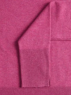 Pull rose uni coupe droite avec un col rond et des manches longues