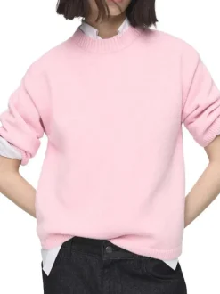 Pull rose uni en maille fine avec une coupe oversize et un col rond