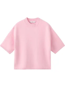 Pull rose uni en maille fine avec une coupe oversize et un col rond