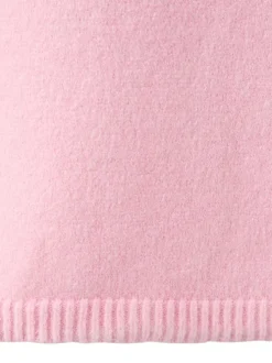 Pull rose uni en maille fine avec une coupe oversize et un col rond