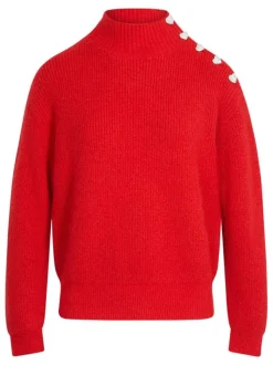 Pull rouge en maille tricotée pourvu d'un col montant et de manches longues