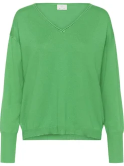 Pull vert uni pourvu d'une coupe droite et de manches longues