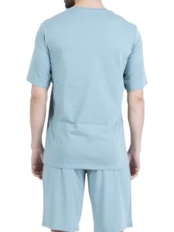 Pyjama court en coton bleu clair uni pourvu d'une coupe droite