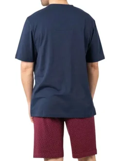 Pyjama court en coton bleu marine à col v avec des minis motifs sur le short