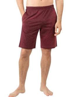 Pyjama court en coton bleu marine à col v avec des minis motifs sur le short