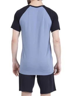 Pyjama court en coton bleu uni pourvu d'une coupe droite et d'un col rond