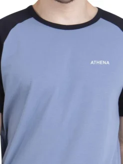 Pyjama court en coton bleu uni pourvu d'une coupe droite et d'un col rond