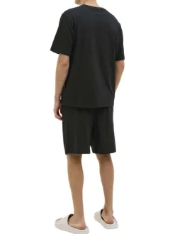 Pyjama Court en coton noir uni avec une coupe fermée et un col rond