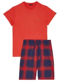 Pyjama court en coton rouge à carreaux avec une coupe droite et un col rond