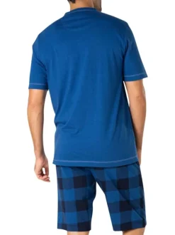 Pyjama en coton bleu à carreaux avec un col tunisien et des manches courtes