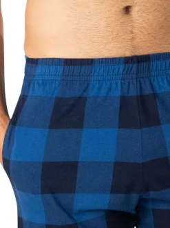 Pyjama en coton bleu à carreaux avec un col tunisien et des manches courtes