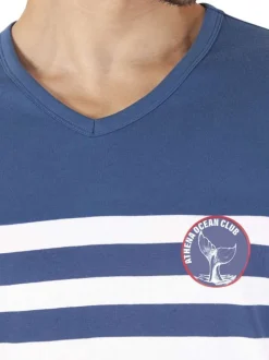 Pyjama long en coton bleu à rayures pourvu d'une coupe droite et d'un col v