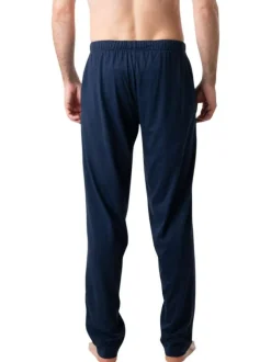 Pyjama long en coton bleu uni à col rond avec une poche plaquée