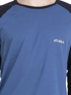 Pyjama long en coton bleu uni pourvu d'une coupe droite et d'un col rond