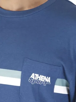 Pyjama long en coton bleu uni pourvu d'une poche plaquée sur le coeur