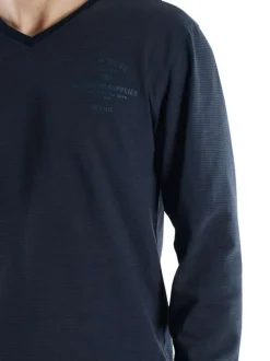 Pyjama long en coton marine uni coupe ajustée col V avec un logo sur la poitrine