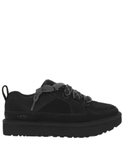 Richelieu en cuir noirs avec un talon plateforme et des lacets larges