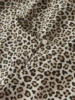 Robe courte en coton biologique animalier uni pourvu d'une taille élastiquée