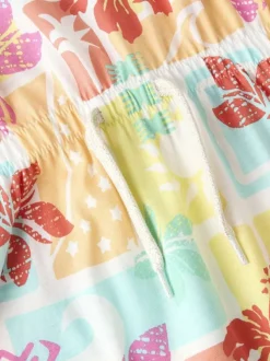 Robe courte en coton biologique multicolore à motifs pourvue d'une coupe évasée