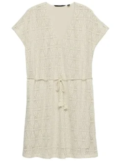 Robe courte beige en guipure à coupe droite pourvue d'un col v profond