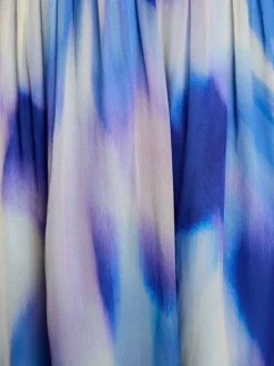 Robe courte bleue à imprimé avec une coupe cintrée et des manches courtes