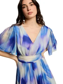 Robe courte bleue à imprimé avec une coupe cintrée et des manches courtes