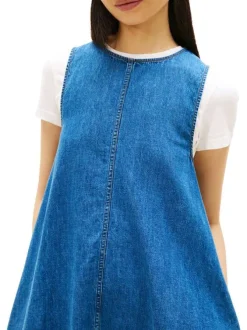 Robe courte en coton indigo unie avec une coupe trapèze et un col rond