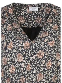 Robe courte noire fleurie à coupe droite un col tunisien et des manches longues